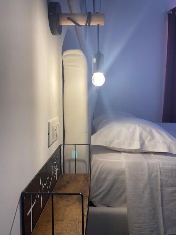 Postel nebo postele na pokoji v ubytování B&B Libertà