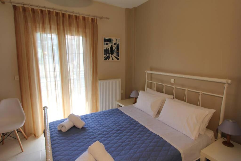 Posteľ alebo postele v izbe v ubytovaní COZY APARTMENT IN THE HEART OF THE TOWN