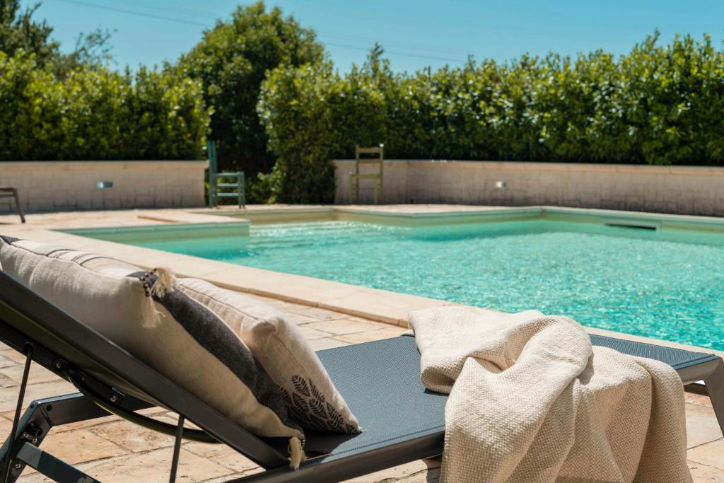 The swimming pool at or close to HelloApulia - Trulli Le Murge