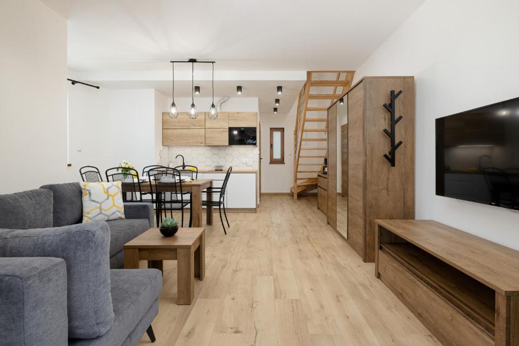 Kuchyňa alebo kuchynka v ubytovaní Apartamenty Zielona 11 by Noclegi Renters
