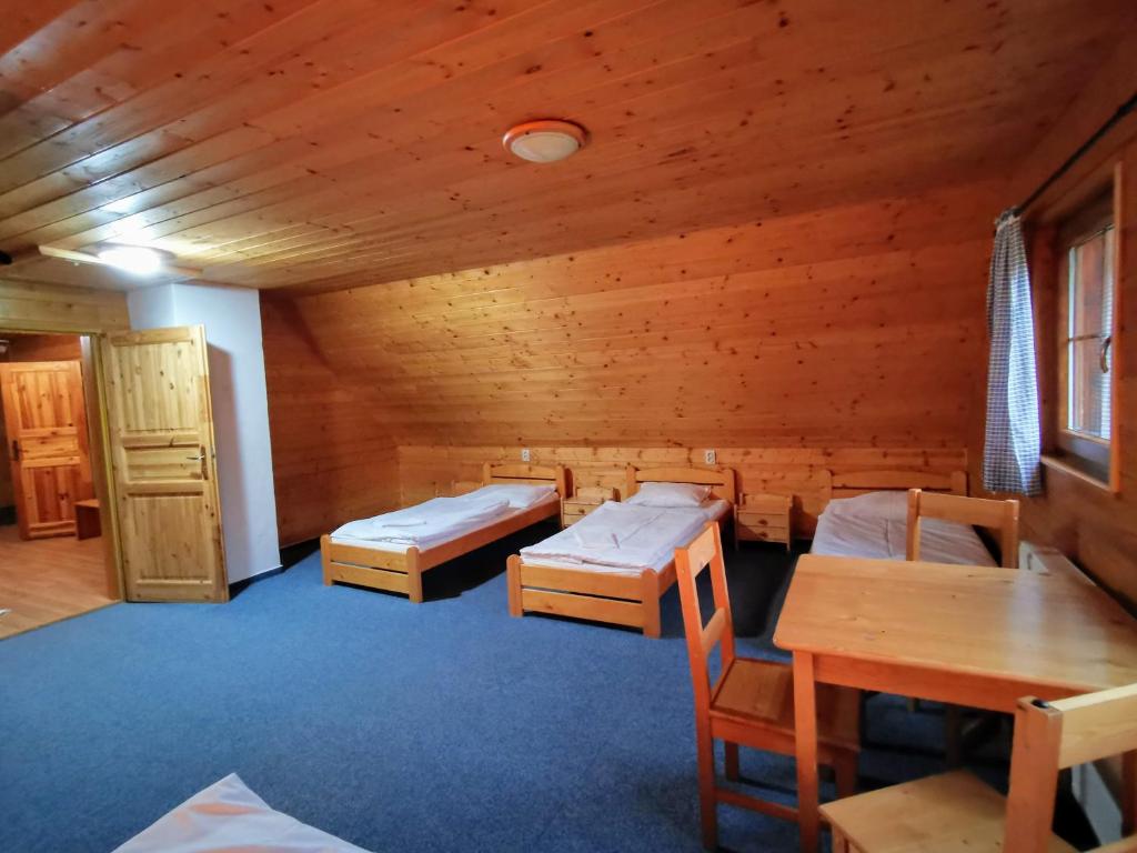 Posteľ alebo postele v izbe v ubytovaní Apartmány Ski areal Kareš