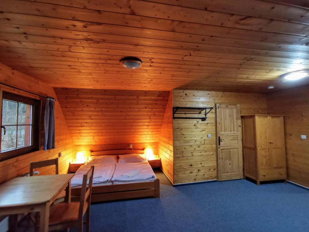 Posteľ alebo postele v izbe v ubytovaní Apartmány Ski areal Kareš
