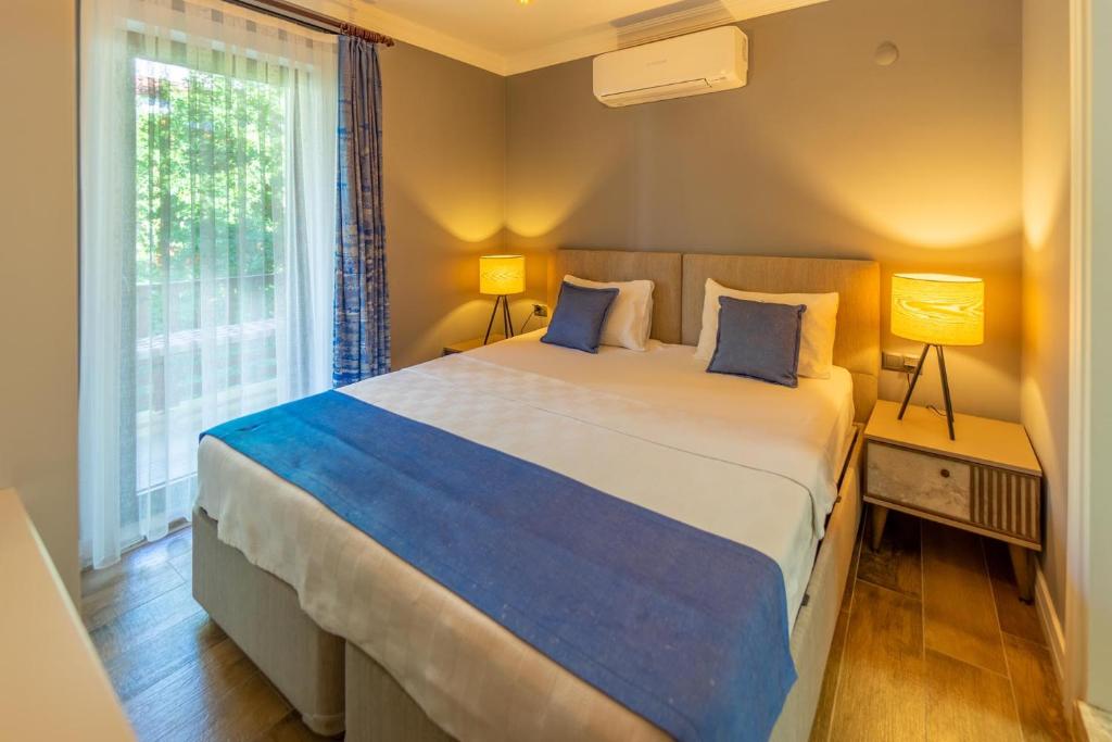 Postel nebo postele na pokoji v ubytování İskelem Otel