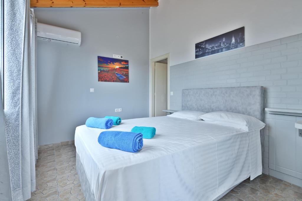 A bed or beds in a room at Fotini Studios