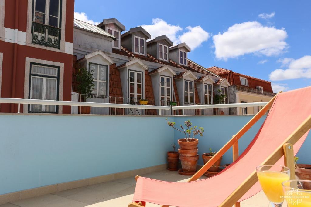 リスボンにあるAzulejos' Charming Apartment with Terrace 2 by Lisbonne Collectionのバルコニー(ハンモック付)