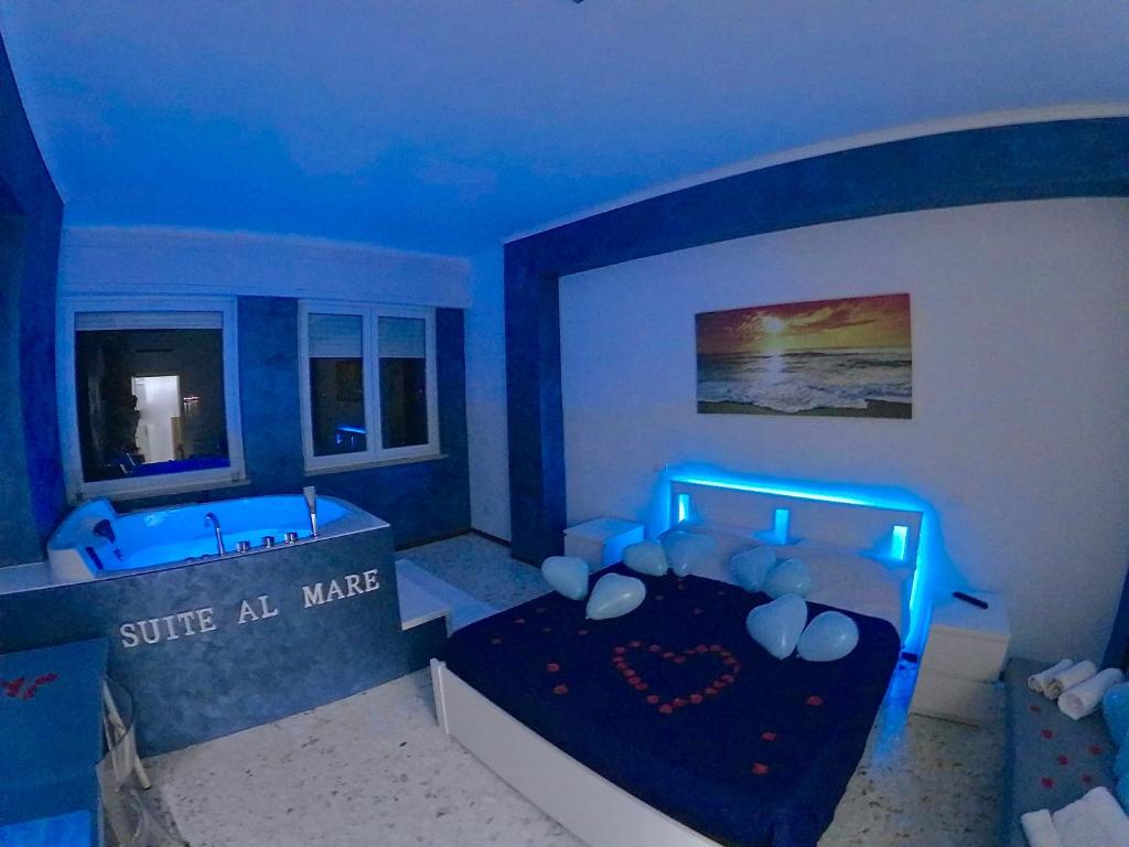 Postel nebo postele na pokoji v ubytování Suite al mare
