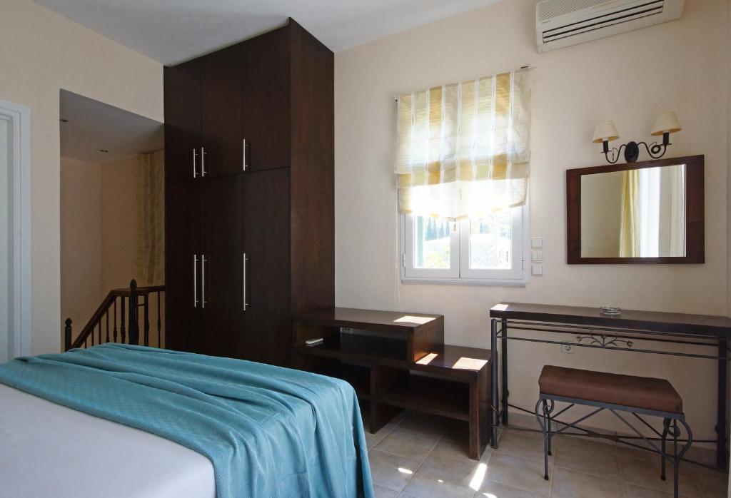 Postel nebo postele na pokoji v ubytování Aegean Villas
