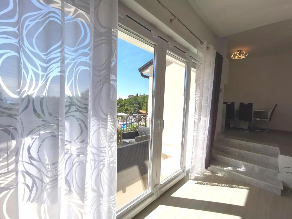 Balkon lub taras w obiekcie Apartments Garden Residence Opatija