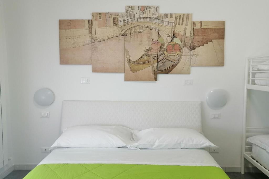Postel nebo postele na pokoji v ubytování GreenColors DEPENDANCE