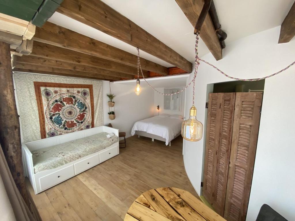 Postel nebo postele na pokoji v ubytování So-Hum