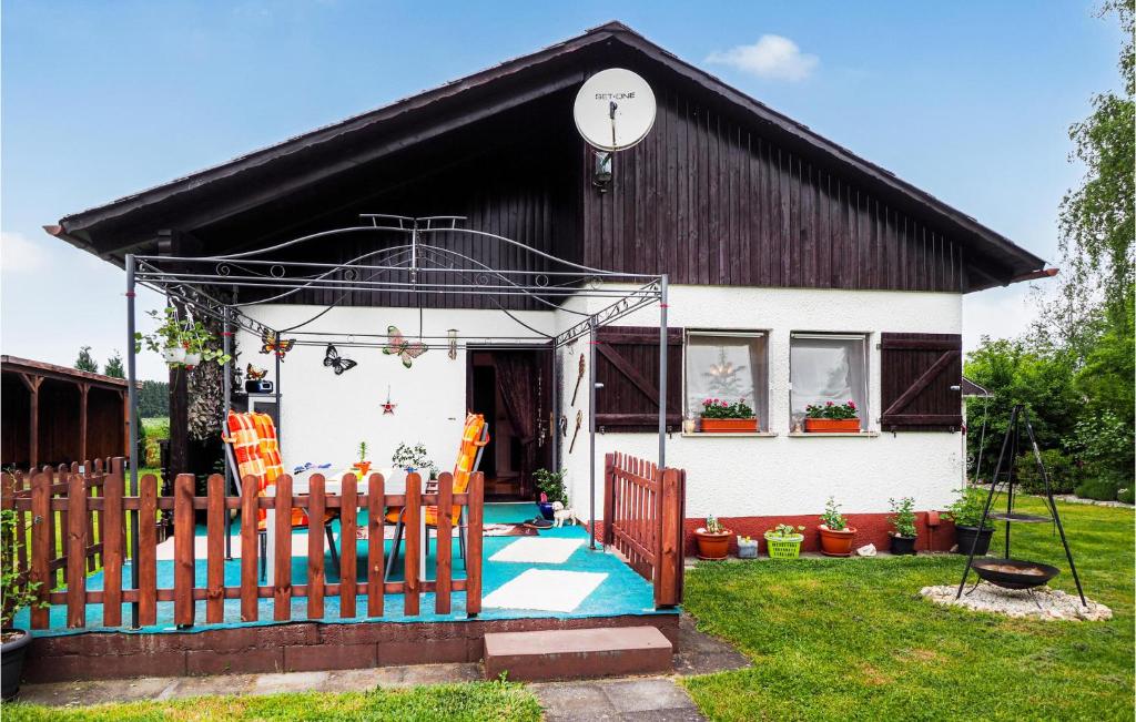 a house with a pool in front of it at Ferienhaus 1 In Thalfang in Thalfang