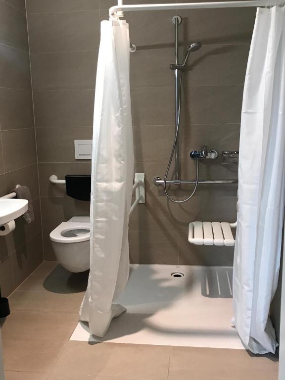 Koupelna v ubytování HITrental Messe Apartments
