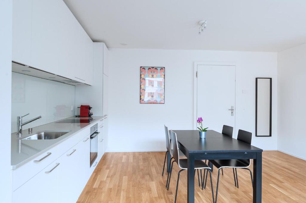 Postel nebo postele na pokoji v ubytování HITrental Messe Apartments