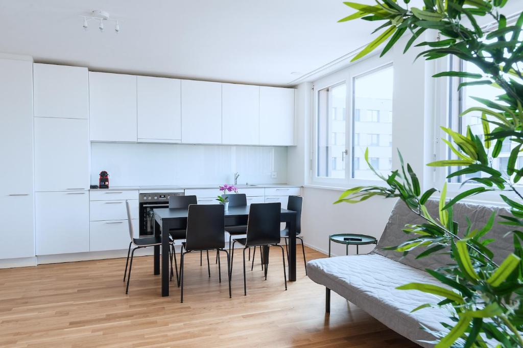 Kuchyň nebo kuchyňský kout v ubytování HITrental Messe Apartments