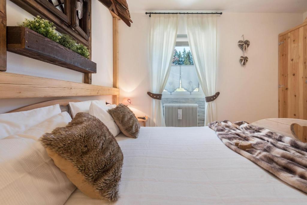 Posteľ alebo postele v izbe v ubytovaní Casa Ferrazza Natalie