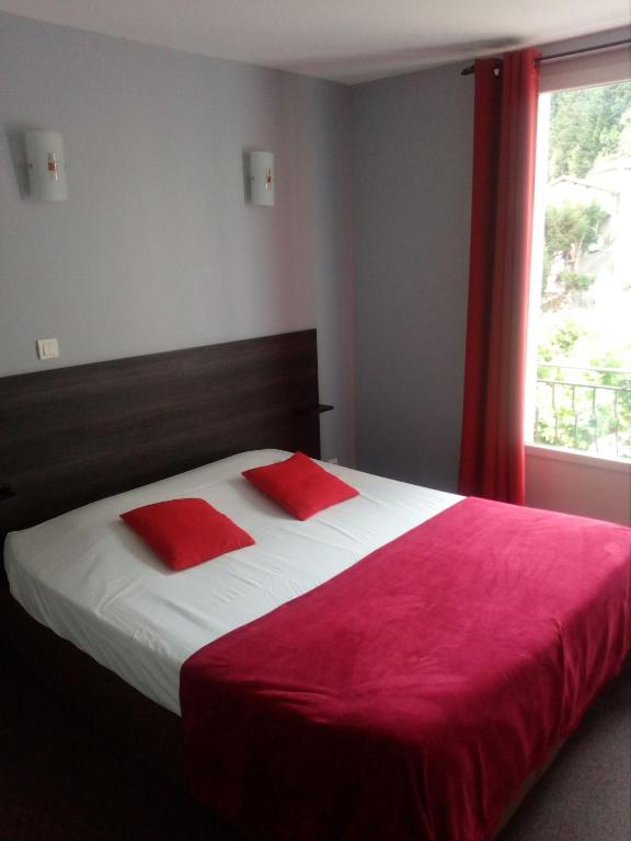 Postel nebo postele na pokoji v ubytování Auberge de Barnas