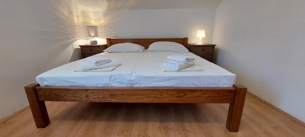 Posteľ alebo postele v izbe v ubytovaní Apartment Sunce