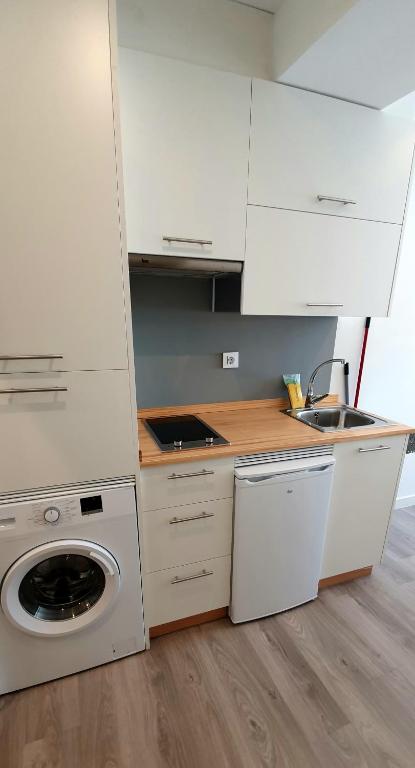 A kitchen or kitchenette at Apartamentos Costa da Morte Muxia