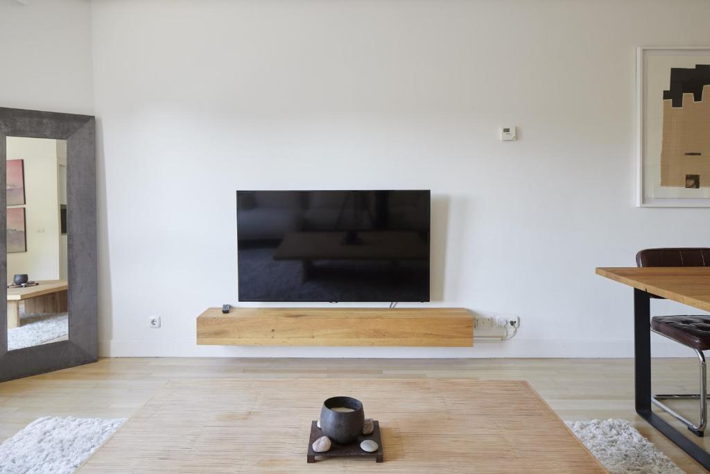 TV a/nebo společenská místnost v ubytování Arraun - Basque Stay