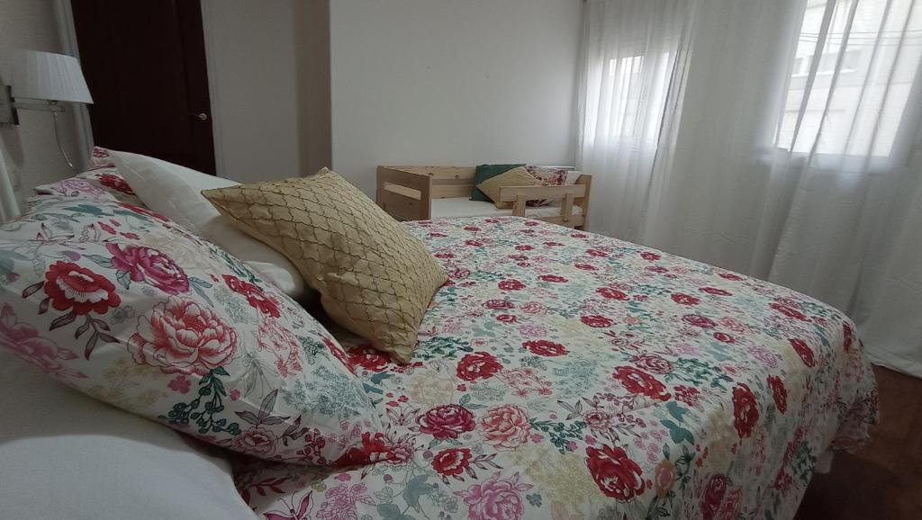Postel nebo postele na pokoji v ubytování O Lagar apartamento grande y luminoso. 8 personas.