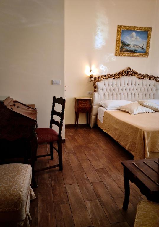 Posteľ alebo postele v izbe v ubytovaní B&B Joan's Heritage