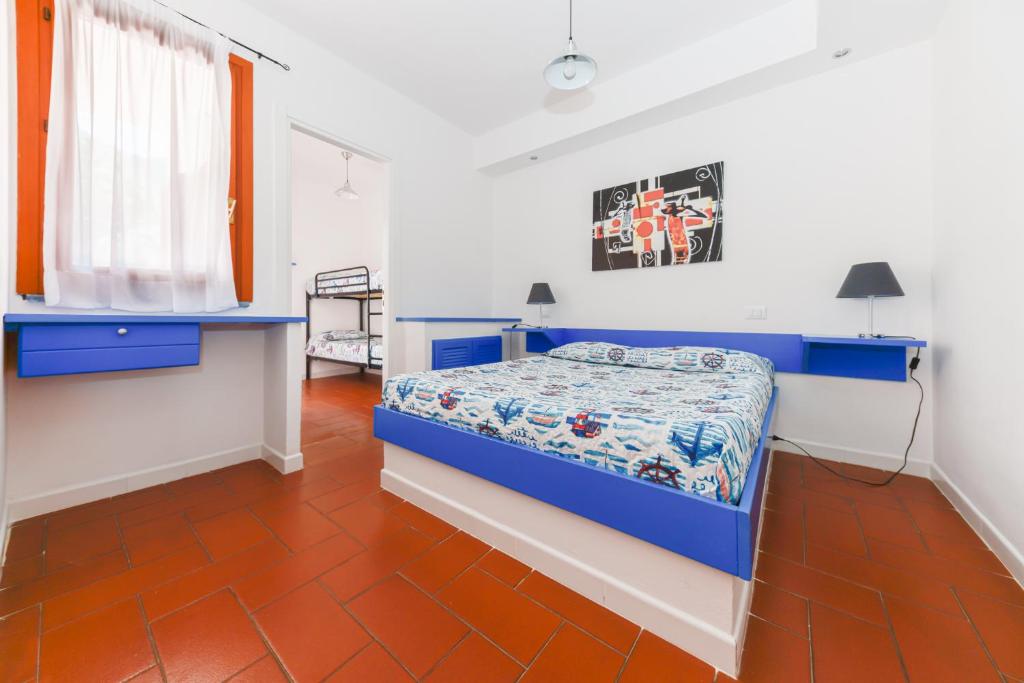 Postel nebo postele na pokoji v ubytování Elba Island Resort Pool & Tennis