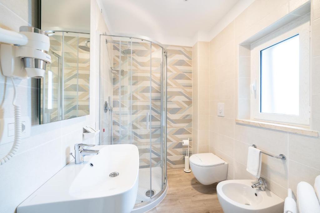 Koupelna v ubytování Hotel Il Gabbiano