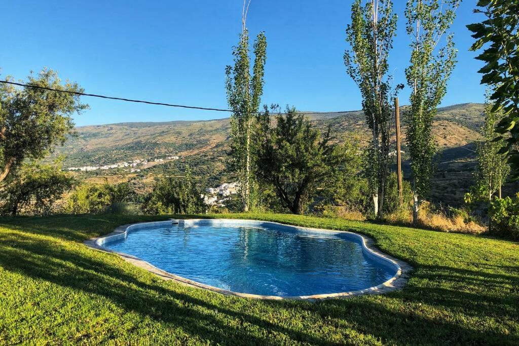 בריכת השחייה שנמצאת ב-Casa El Higueral או באזור