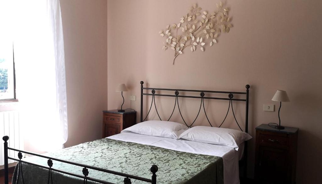 A bed or beds in a room at Piazza degli Angeli