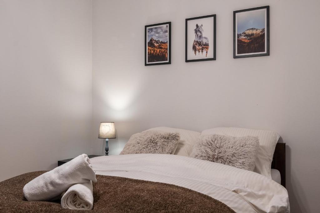 Posteľ alebo postele v izbe v ubytovaní Apartament Konda