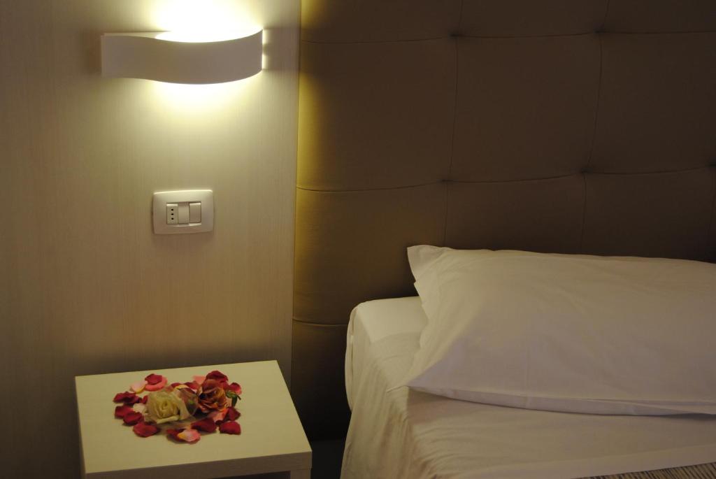 Postel nebo postele na pokoji v ubytování Hotel Tenerife