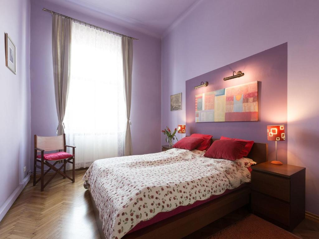 Llit o llits en una habitació de Old Town Apartment