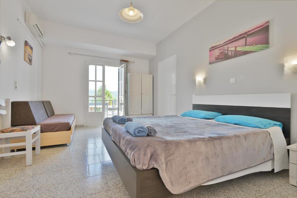 A bed or beds in a room at Fotini Studios