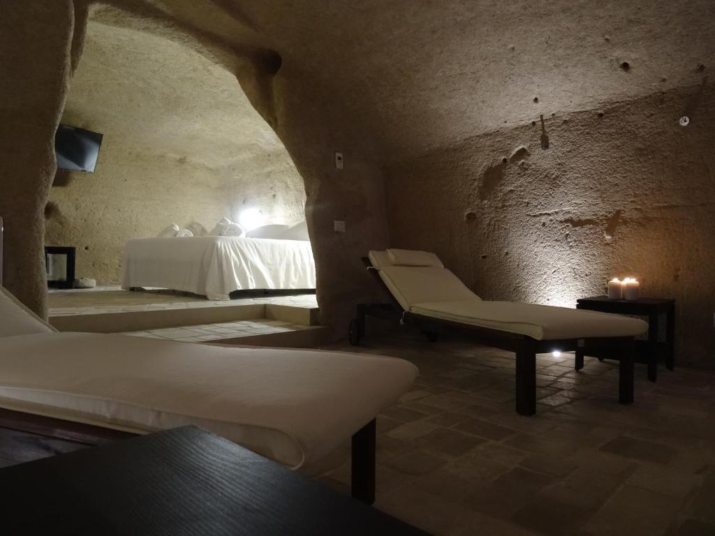 Postel nebo postele na pokoji v ubytování LA DIMORA DELLE 3 ZIE