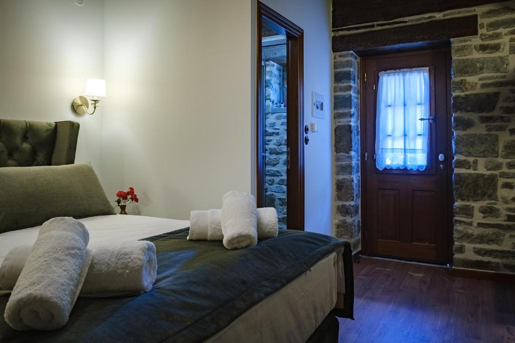 Postel nebo postele na pokoji v ubytování Guest House Anthrakitis