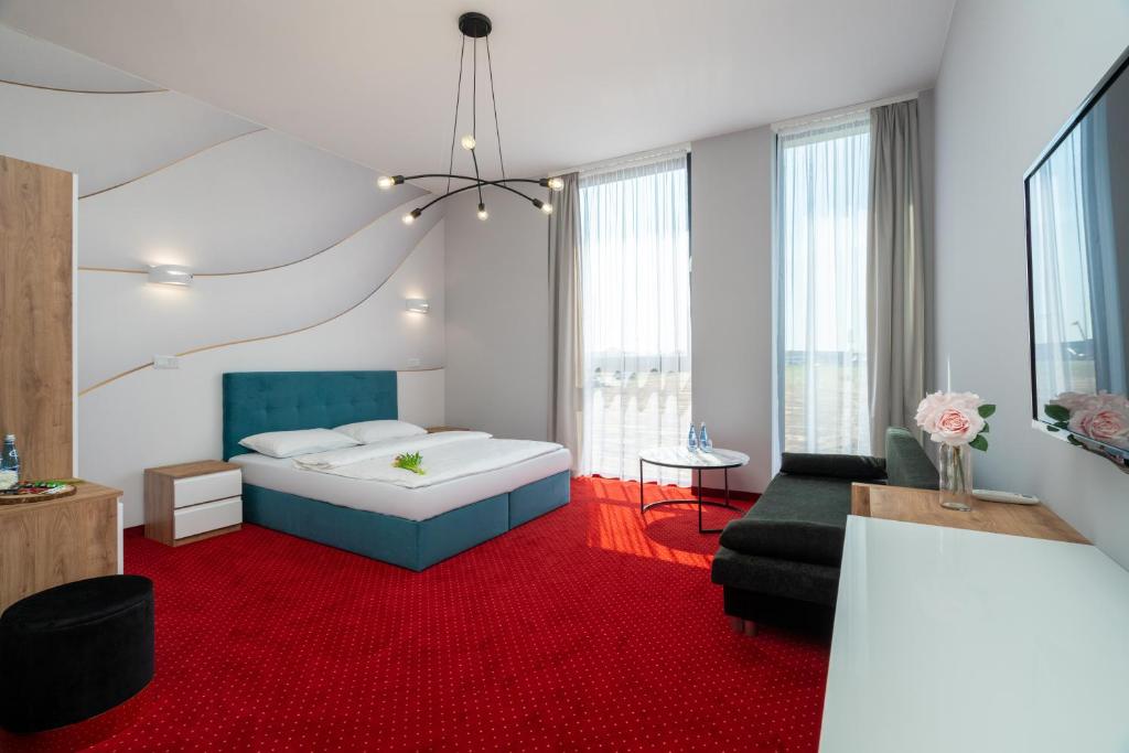 Posteľ alebo postele v izbe v ubytovaní Aquila Hotel