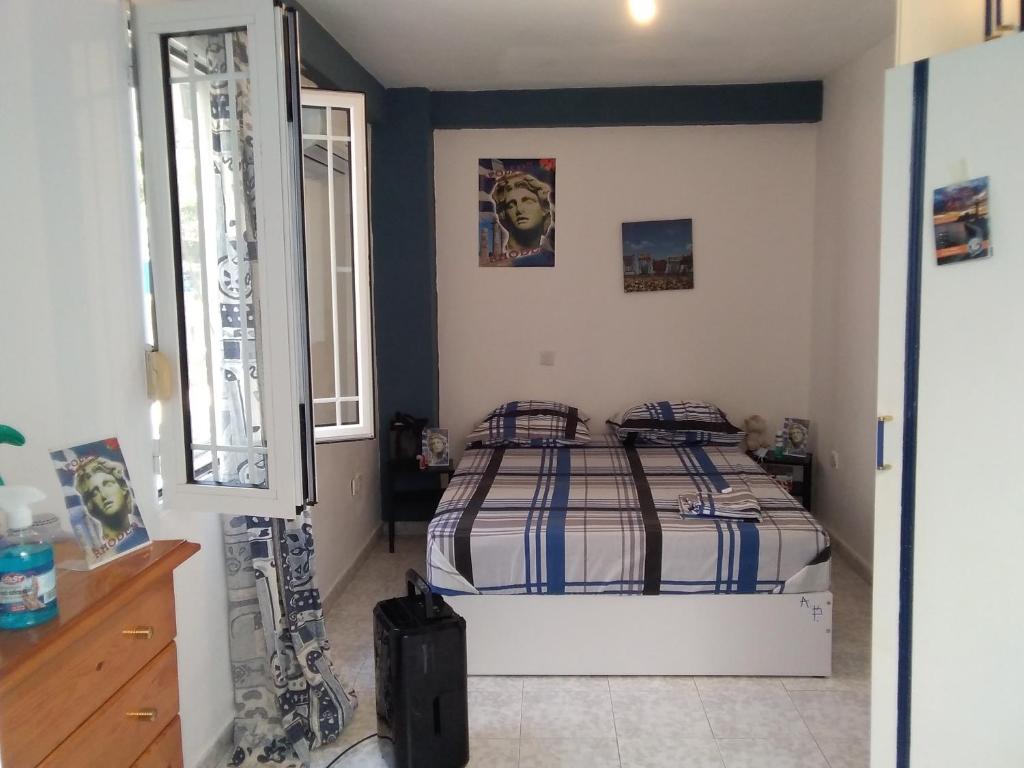 Posteľ alebo postele v izbe v ubytovaní Apollon Apartments H-2