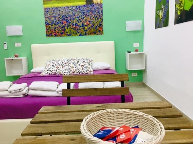 A bed or beds in a room at Decumani Prestige