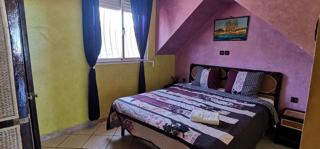 Postel nebo postele na pokoji v ubytování Frikrik maison au bord de mer