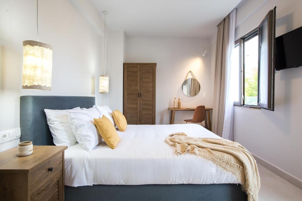 Postel nebo postele na pokoji v ubytování Calmare suites