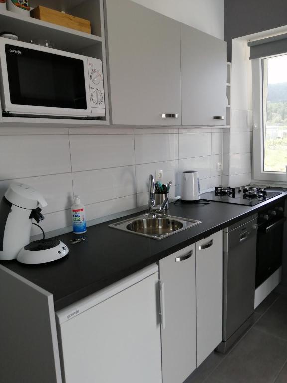 Кухня или мини-кухня в Apartment "MANNA
