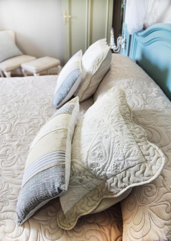 A bed or beds in a room at La casetta sulle Stelle