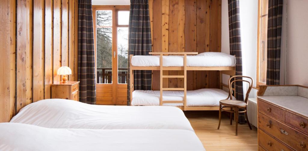 Postel nebo postele na pokoji v ubytování Grand Hôtel & Kurhaus