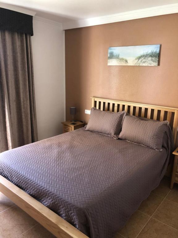 Posteľ alebo postele v izbe v ubytovaní CASA CIERVOS Bahía de Vera NATURISTA