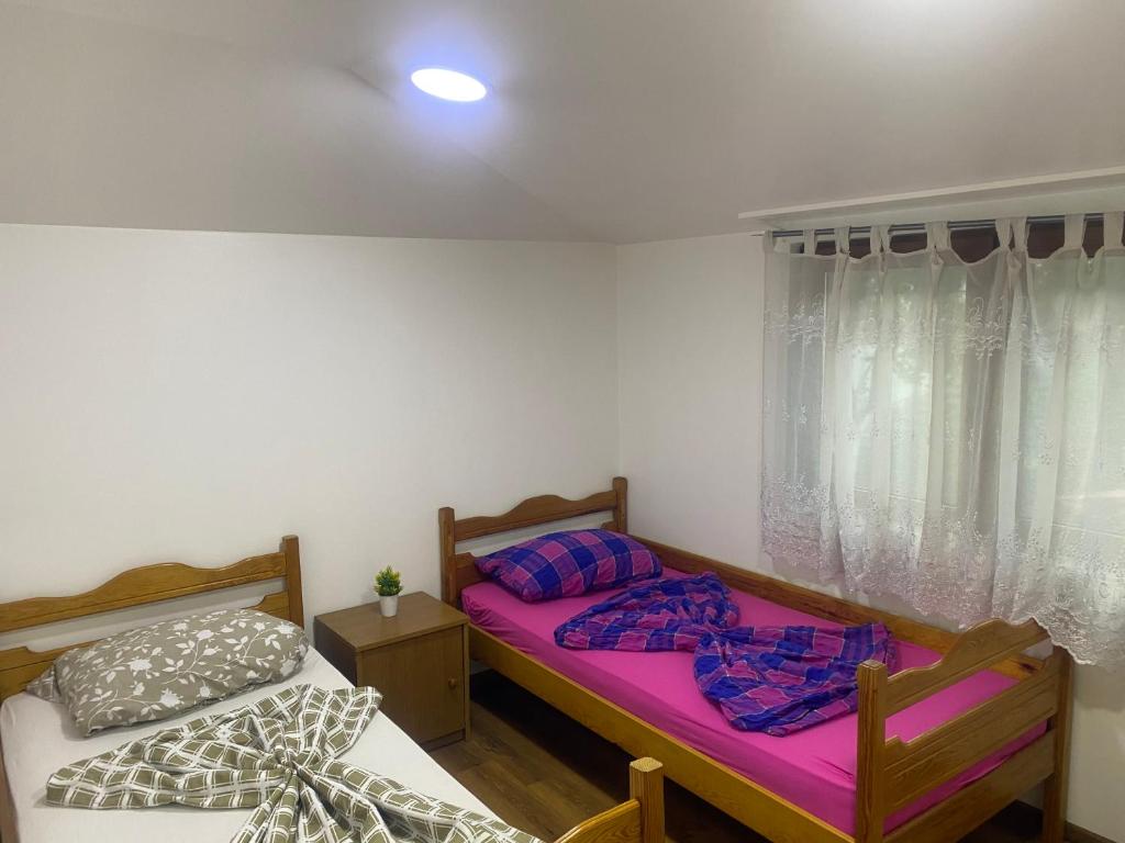 Postel nebo postele na pokoji v ubytování Apartment Poturmahala
