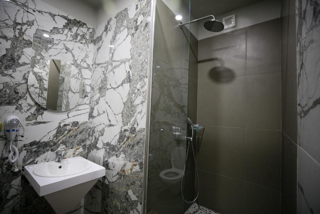 Koupelna v ubytování Hotel Lotus