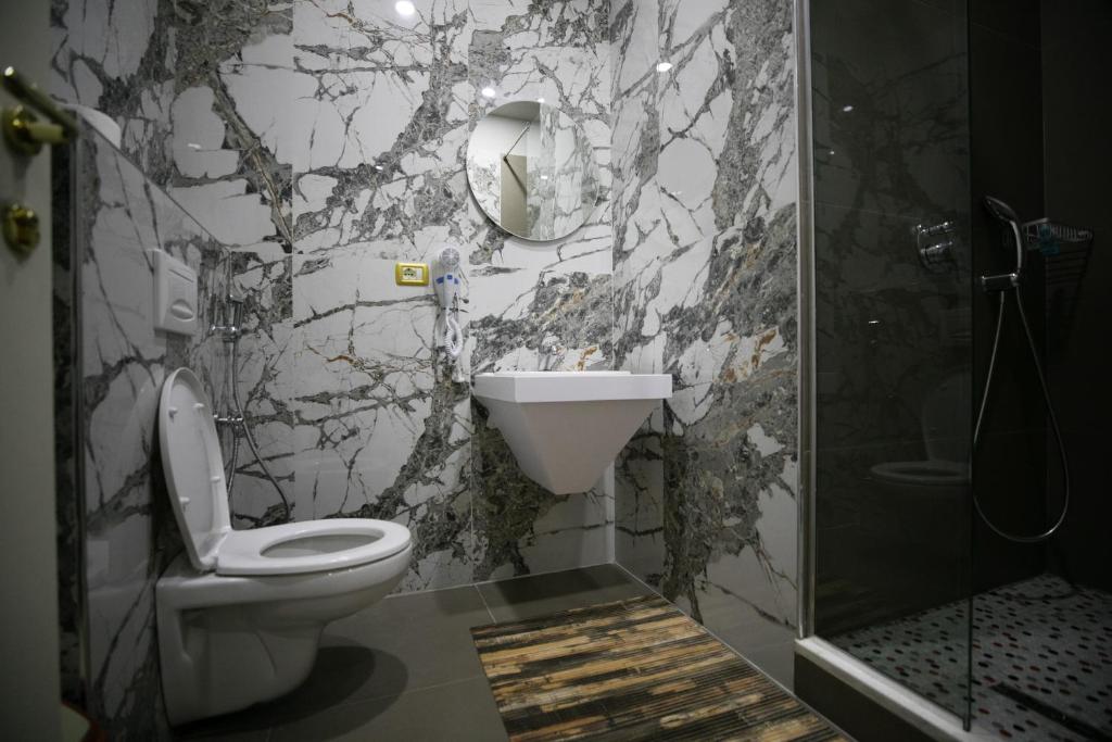 Koupelna v ubytování Hotel Lotus