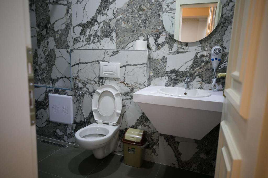 Koupelna v ubytování Hotel Lotus