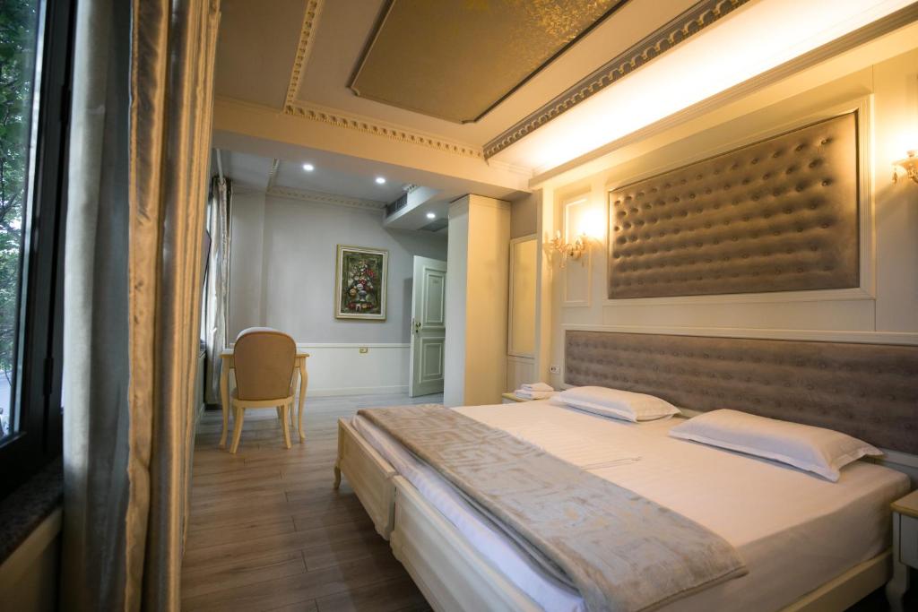 Postel nebo postele na pokoji v ubytování Hotel Lotus