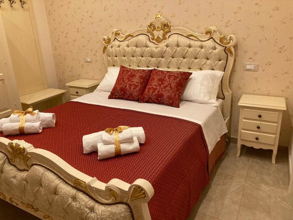 A bed or beds in a room at B&B Orchidea